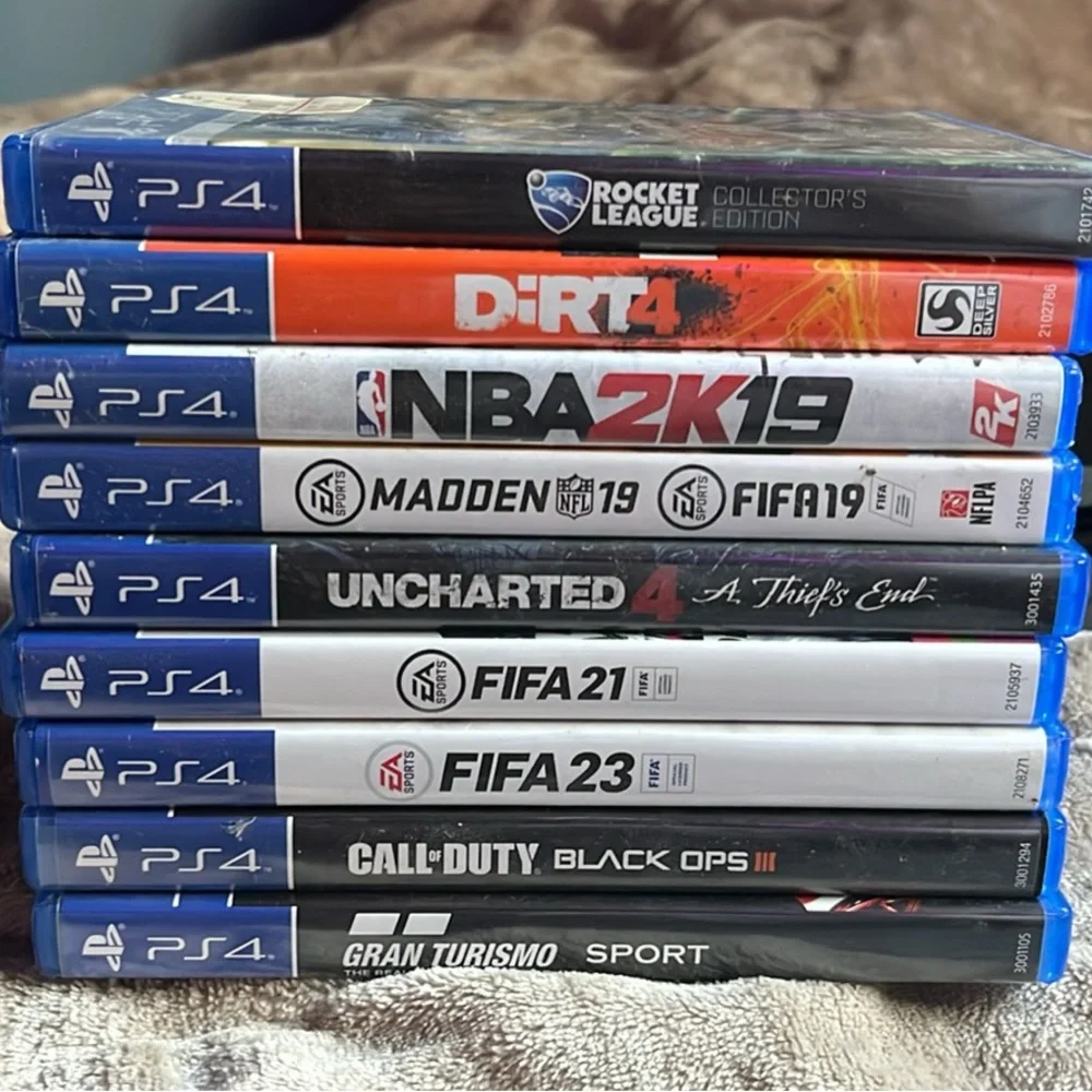 Sony PlayStation 4 Console with games and controllers